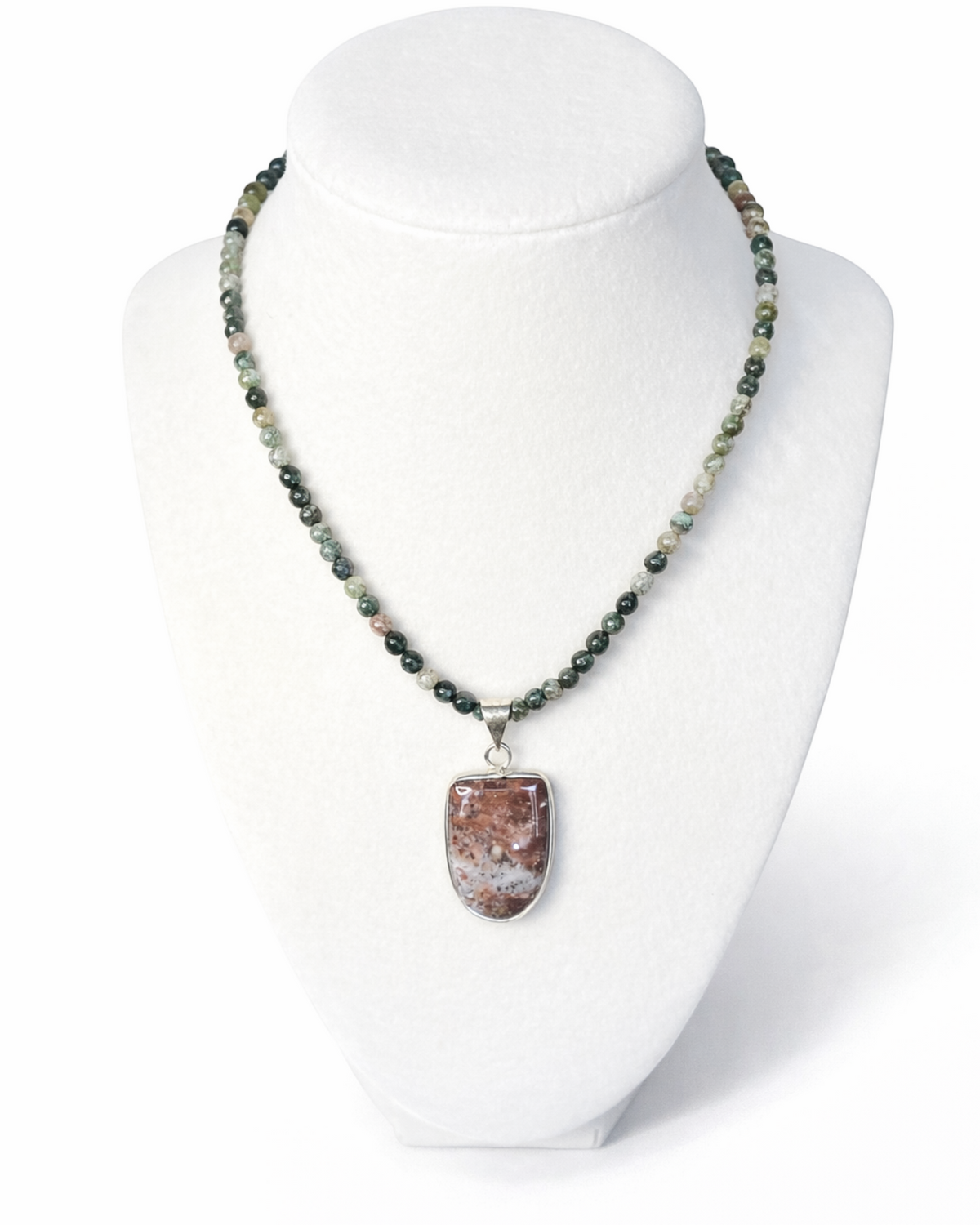 Amelia Jane Handmade Creations Indian agate beaded necklace with a silver-set ocean jasper pendant on a white bust