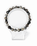 Amelia Jane Handmade Creations 7-inch beaded bracelet featuring grey Dragon’s Vein Agate and smooth black Onyx stones.