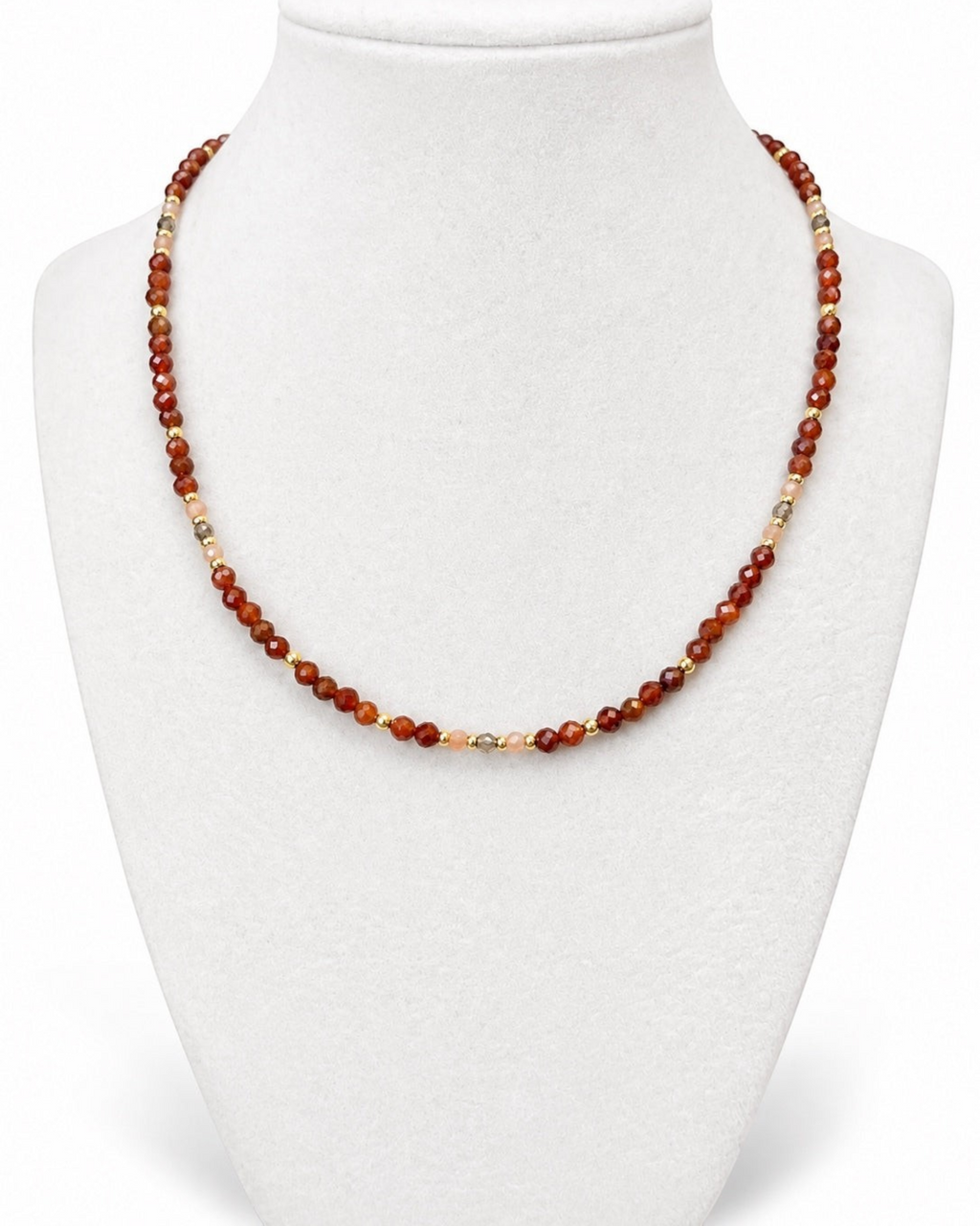 Amelia Jane Handmade Creations Autumn Glow beaded necklace with hessonite garnet, peach moonstone, and gold accents.
