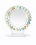 Amelia Jane Handmade Creations 7-inch Caribbean blue calcite beaded bracelet on a clear circular display stand