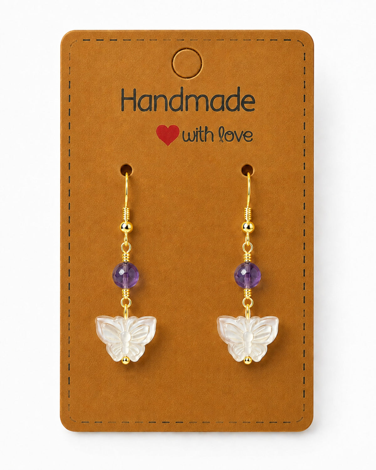Amelia Jane Handmade Creations butterfly earrings with mother of pearl, purple beads, and gold s925 posts on a card.