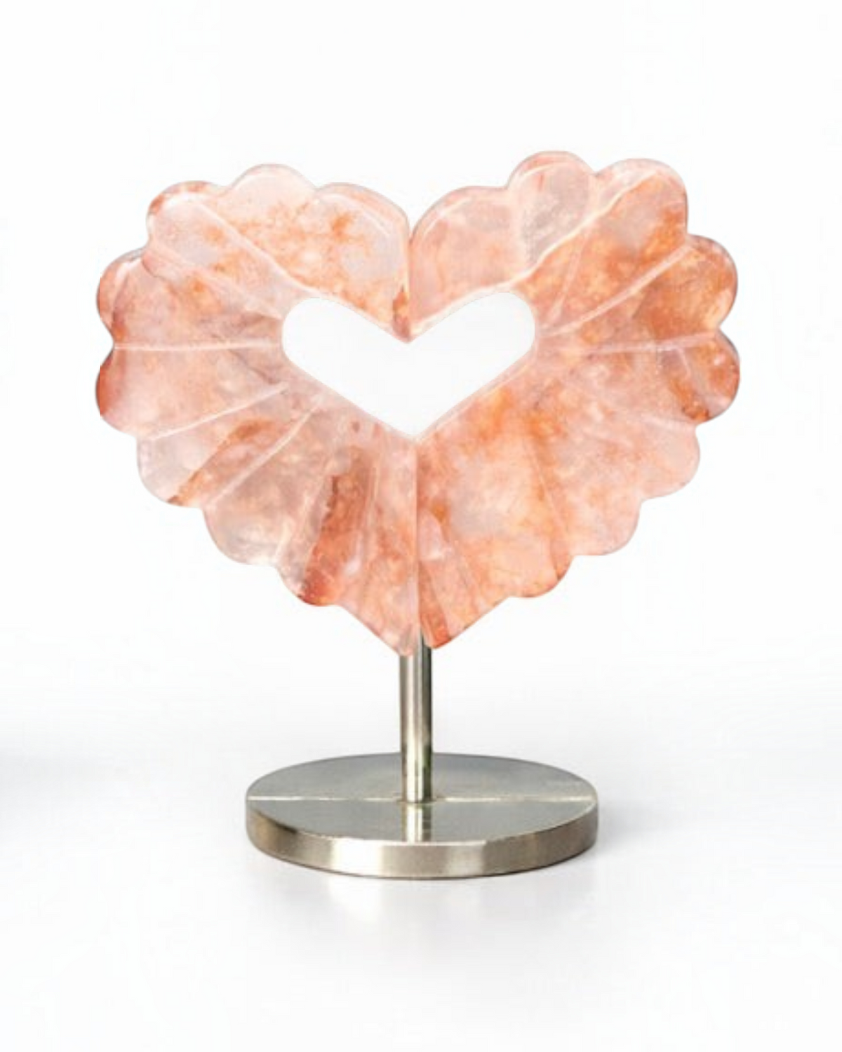 Amelia Jane Handmade Creations fire quartz heart leaf carving with intricate detailing on a metal display stand.
