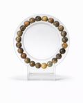 Amelia Jane Handmade Creations 7-inch flower agate beaded bracelet on a clear circular display stand.