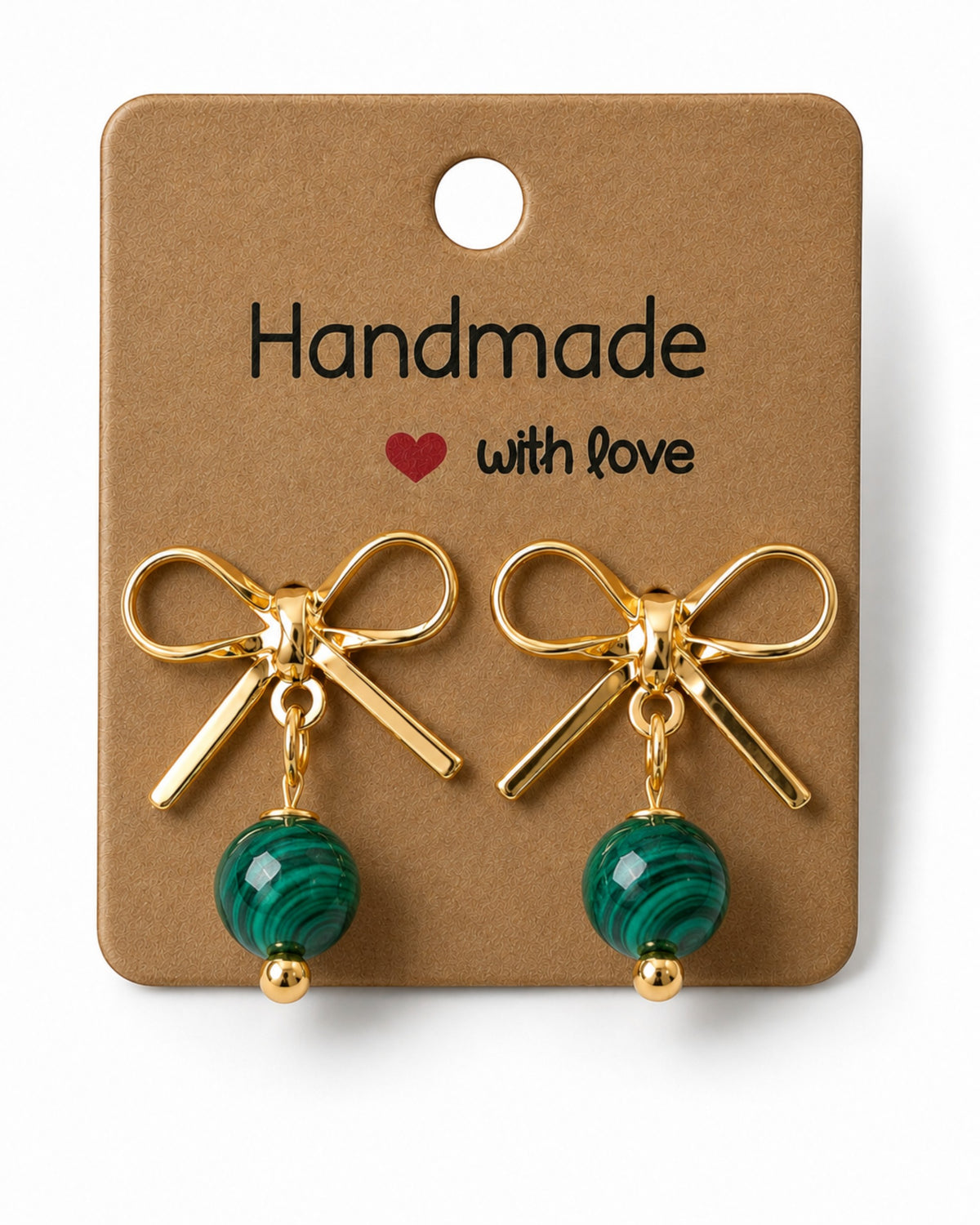 Amelia Jane Handmade Creations gold plated bow stud earrings with dangling green malachite beads on a display card.