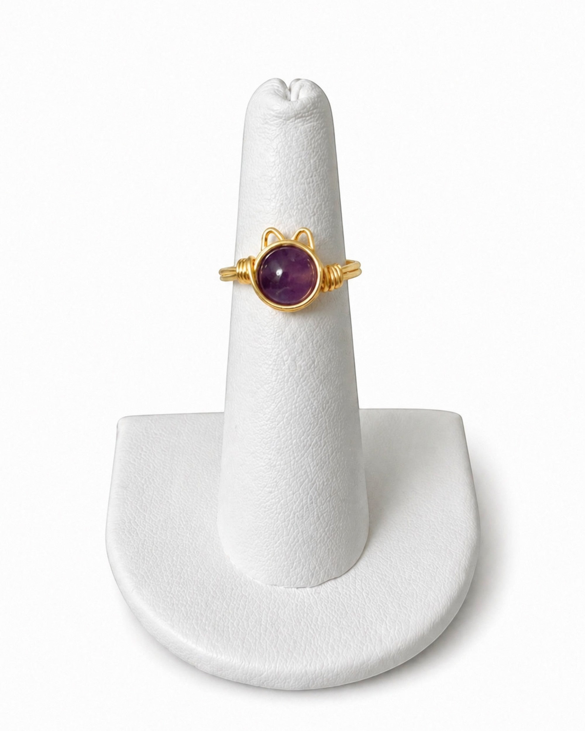 Amelia Jane Handmade Creations wire wrapped kitty ring with a round purple amethyst stone and gold wire band
