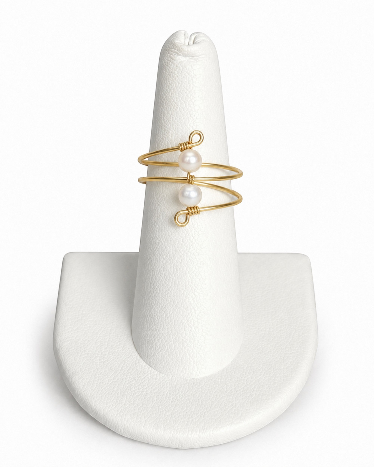 Amelia Jane Handmade Creations gold wire wrap ring featuring two delicate white pearls on a white display stand