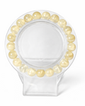 Amelia Jane Handmade Creations 7-inch golden silk jade beaded bracelet on a clear circular display stand.