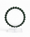 Amelia Jane Handmade Creations 7-inch green sandstone beaded bracelet on a clear display stand