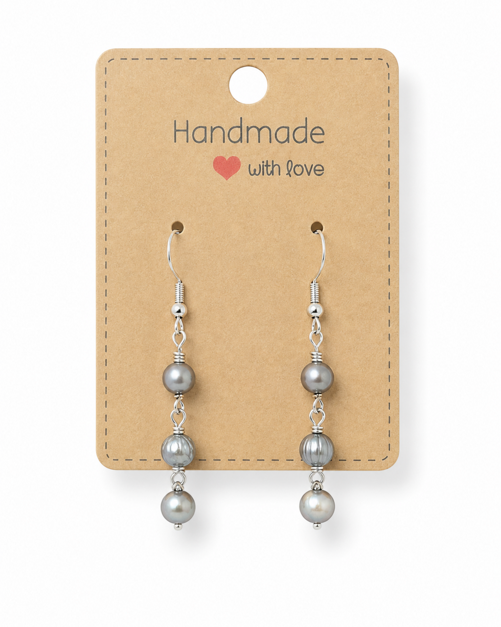 Amelia Jane Handmade Creations freshwater pearl dangle earrings with S925 silver posts on a kraft display card.