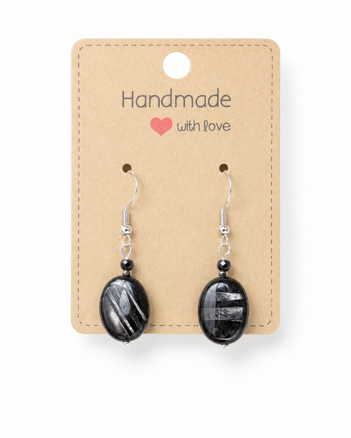 Amelia Jane Handmade Creations hypersthene oval drop earrings with S925 silver posts on a handmade display card.