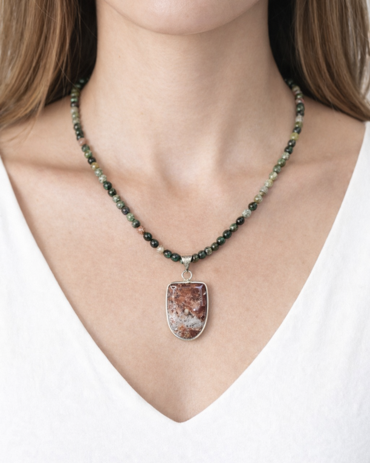 Amelia Jane Handmade Creations Indian agate beaded necklace with a large ocean jasper pendant worn on a model