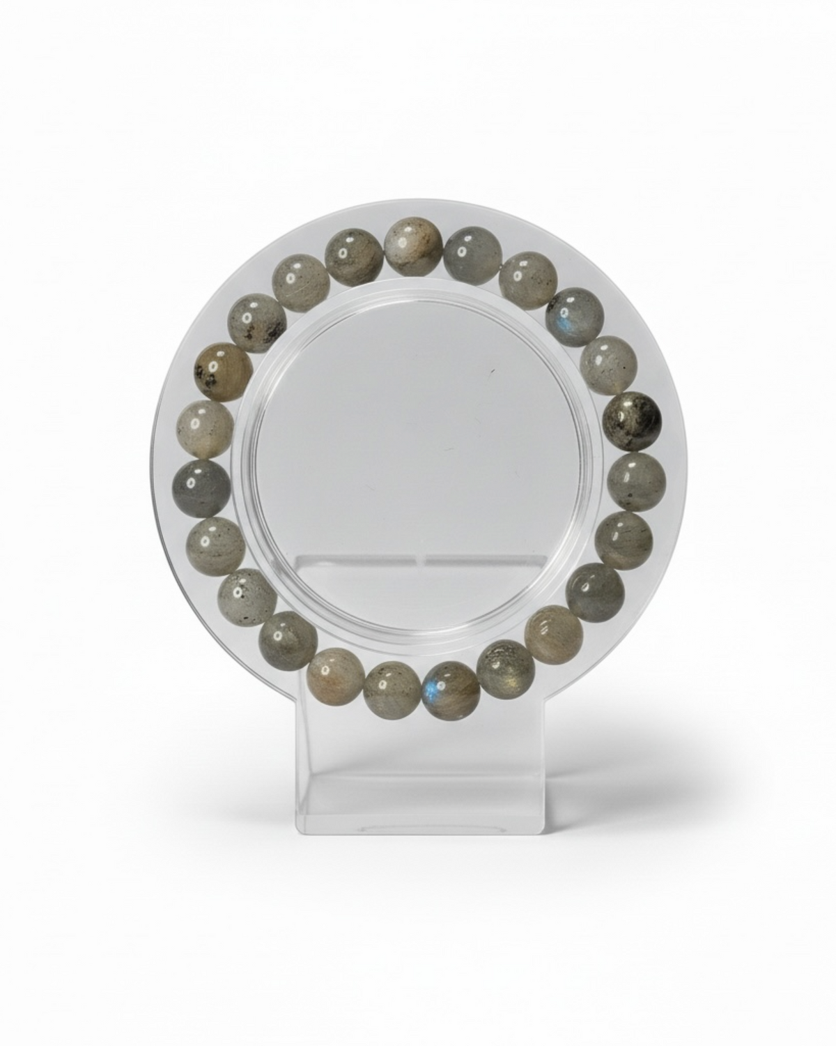Amelia Jane Handmade Creations 7-inch labradorite beaded bracelet with grey iridescent gemstone spheres on a stand