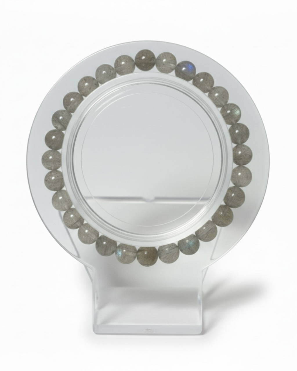 Amelia Jane Handmade Creations 7-inch beaded bracelet featuring round grey labradorite gemstones on a clear stand.