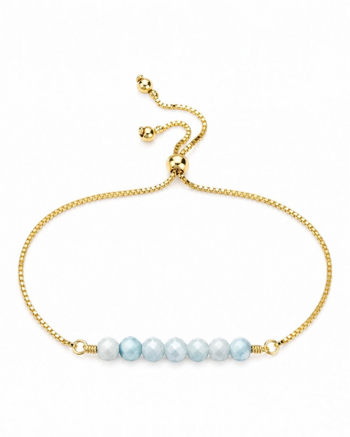 Amelia Jane Handmade Creations Larimar bracelet featuring faceted light blue beads on an adjustable gold chain