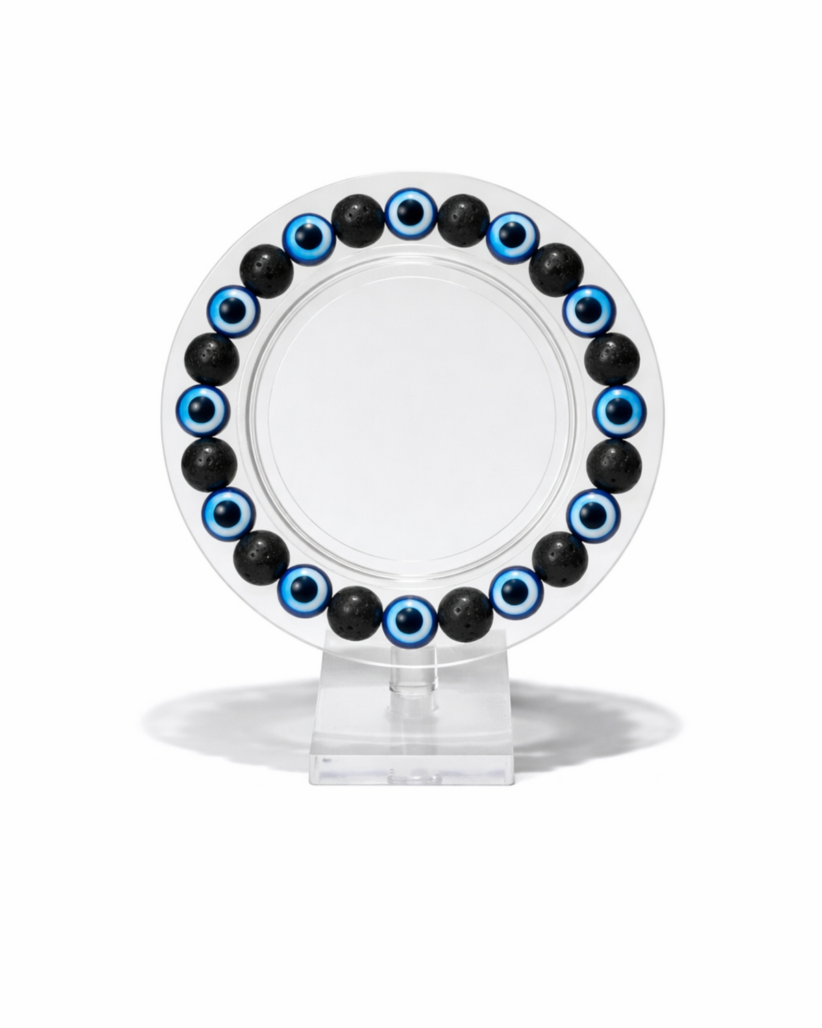 Amelia Jane Handmade Creations 7-inch bracelet featuring alternating black lava rock beads and blue evil eye charms.