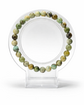 Amelia Jane Handmade Creations 7-inch lime green jasper beaded bracelet on a clear circular display stand