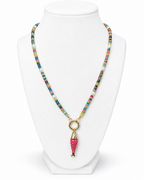 Amelia Jane Handmade Creations Lucky Catch necklace featuring a pink fish charm, multicolored jade, and pearls.