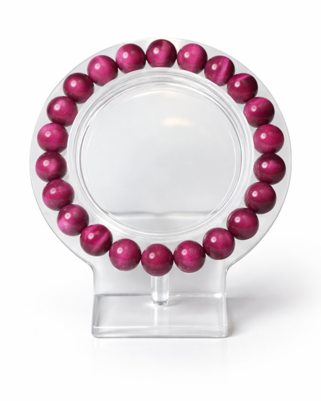 Amelia Jane Handmade Creations 7-inch magenta tiger's eye beaded bracelet on a clear display stand