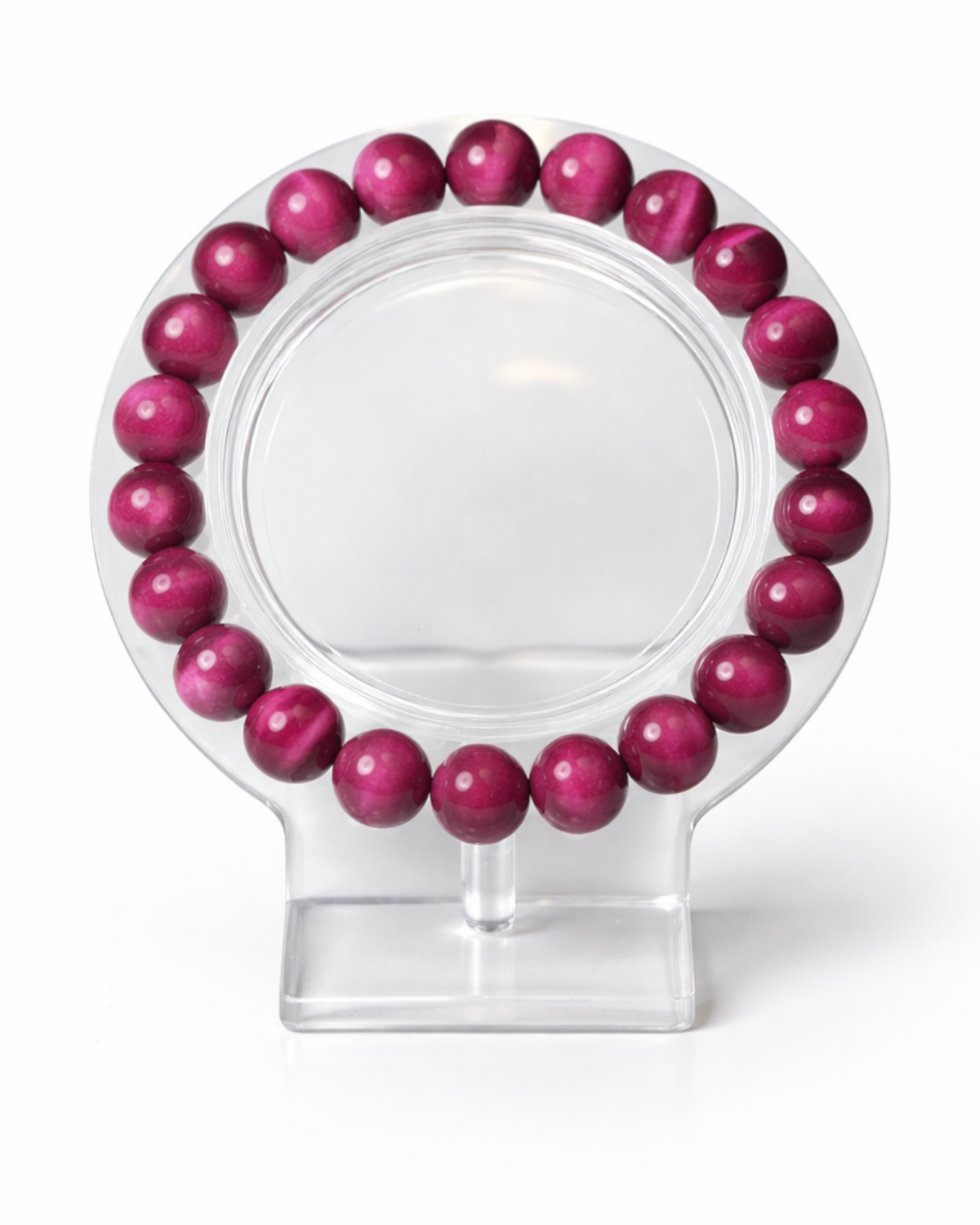 Amelia Jane Handmade Creations 7-inch magenta tiger's eye beaded bracelet on a clear display stand