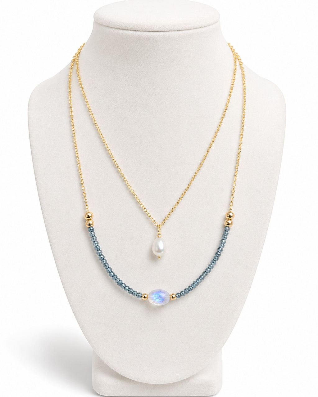 Amelia Jane Handmade Creations Moonlit Tides necklace with 14k gold filled chain, blue topaz, moonstone, and pearl.