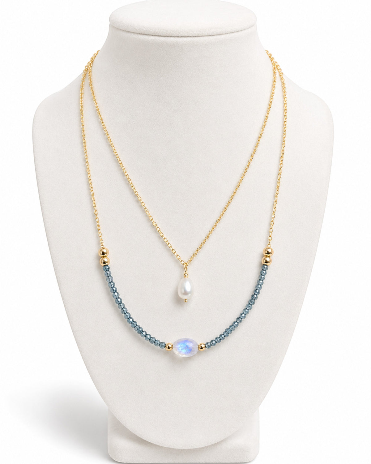 Amelia Jane Handmade Creations Moonlit Tides necklace with 14k gold filled chain, blue topaz, moonstone, and pearl.