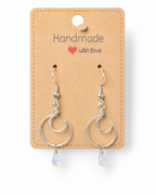 Amelia Jane Handmade Creations moonstone moon earrings with S925 silver wire on a kraft paper display card