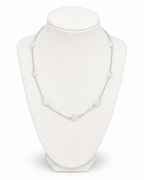 Amelia Jane Handmade Creations 18-inch moonstone necklace with wire-wrapped translucent stones on a silver chain.