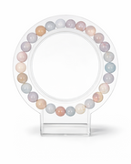 Amelia Jane Handmade Creations 7-inch morganite beaded bracelet featuring soft pastel gemstone spheres on a display