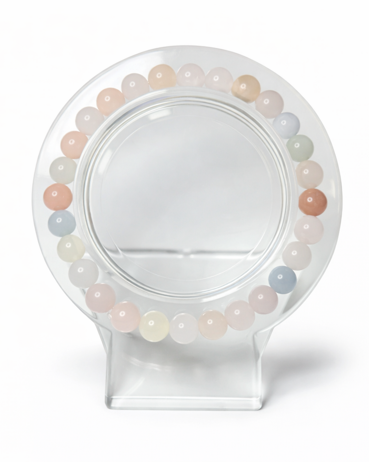 Amelia Jane Handmade Creations 7-inch beaded morganite bracelet with soft pastel gemstone hues on a clear stand