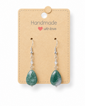 Amelia Jane Handmade Creations moss agate teardrop earrings with S925 silver posts on a display card