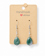 Amelia Jane Handmade Creations moss agate teardrop earrings with S925 silver posts on a display card