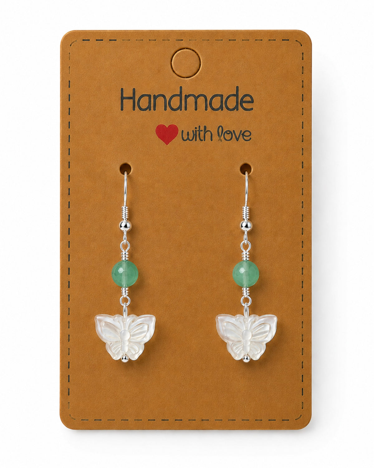 Amelia Jane Handmade Creations butterfly earrings featuring carved mother of pearl, green beads, and s925 silver posts.