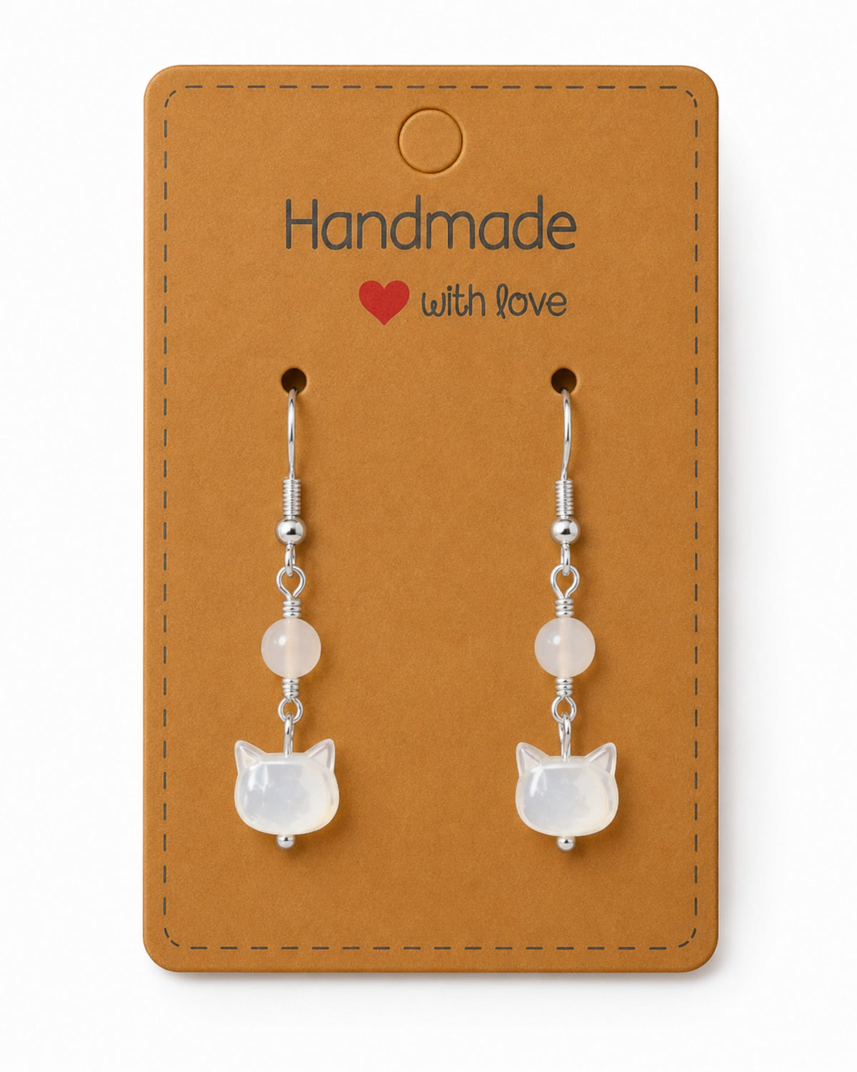 Amelia Jane Handmade Creations mother of pearl cat earrings with s925 silver posts on a handmade display card