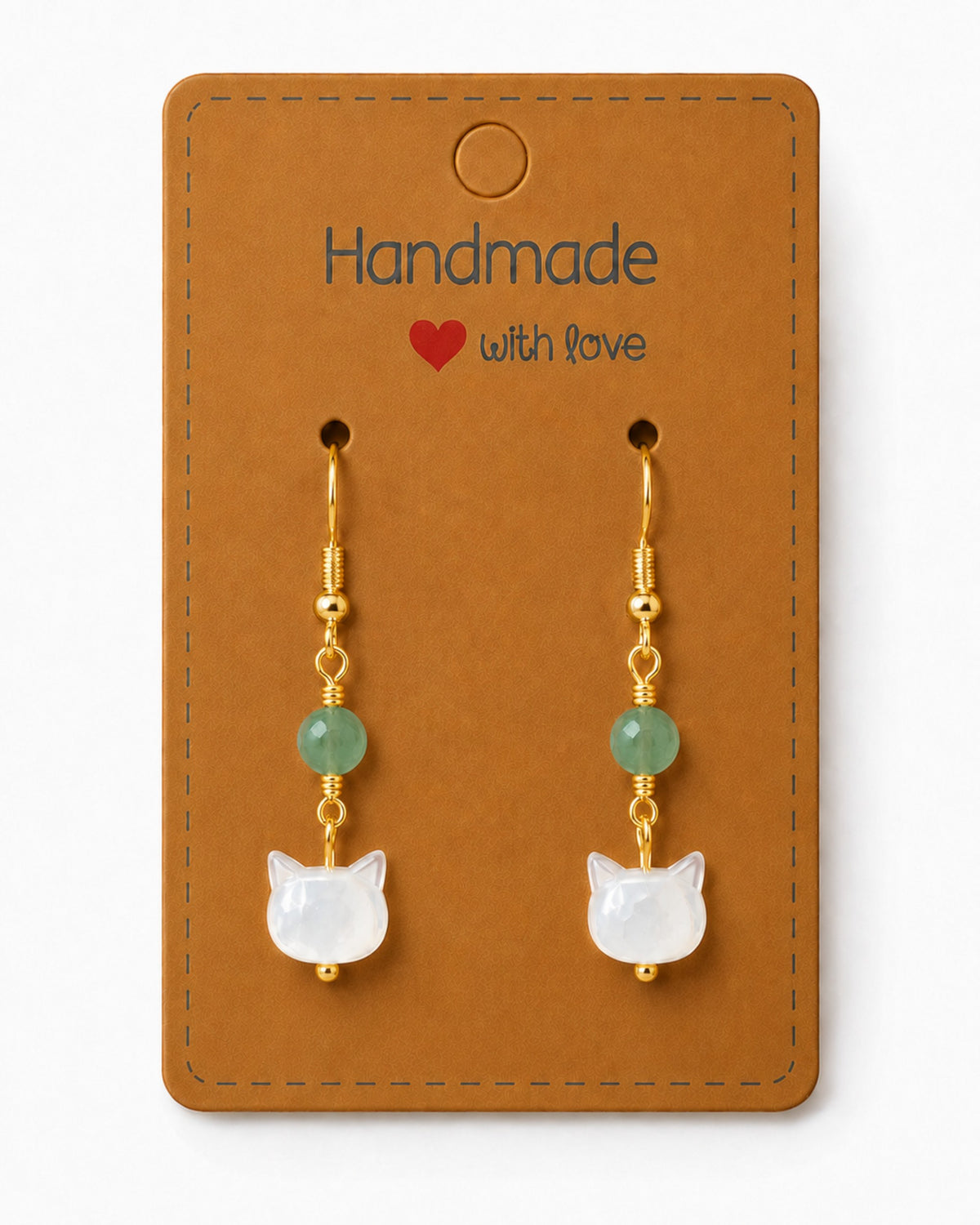 Amelia Jane Handmade Creations mother of pearl kitty earrings with green beads and gold s925 posts on display card