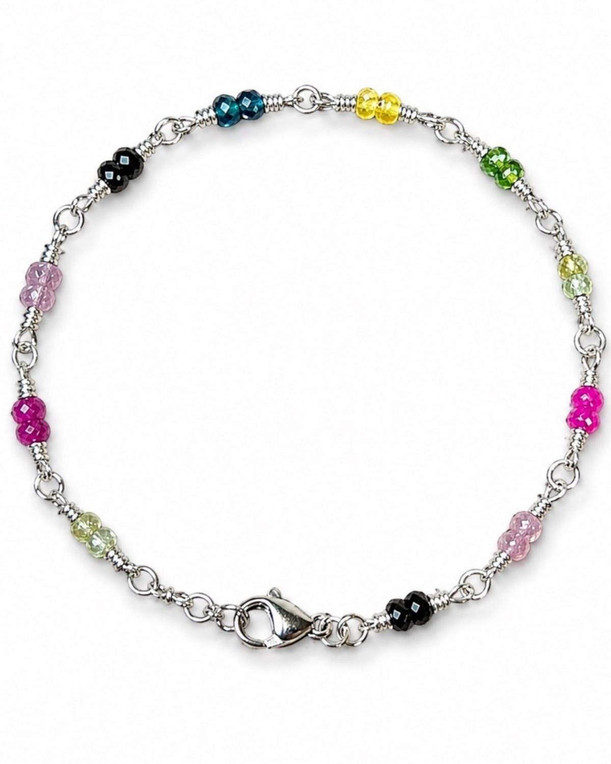 Amelia Jane Handmade Creations 7-inch bracelet with multicolor faceted zircon beads on a delicate silver chain.