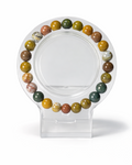 Amelia Jane Handmade Creations 7-inch ocean jasper beaded bracelet featuring multi-colored natural stone spheres.