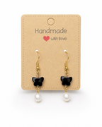 Amelia Jane Handmade Creations faceted black onyx butterfly earrings with freshwater pearls on sterling silver posts