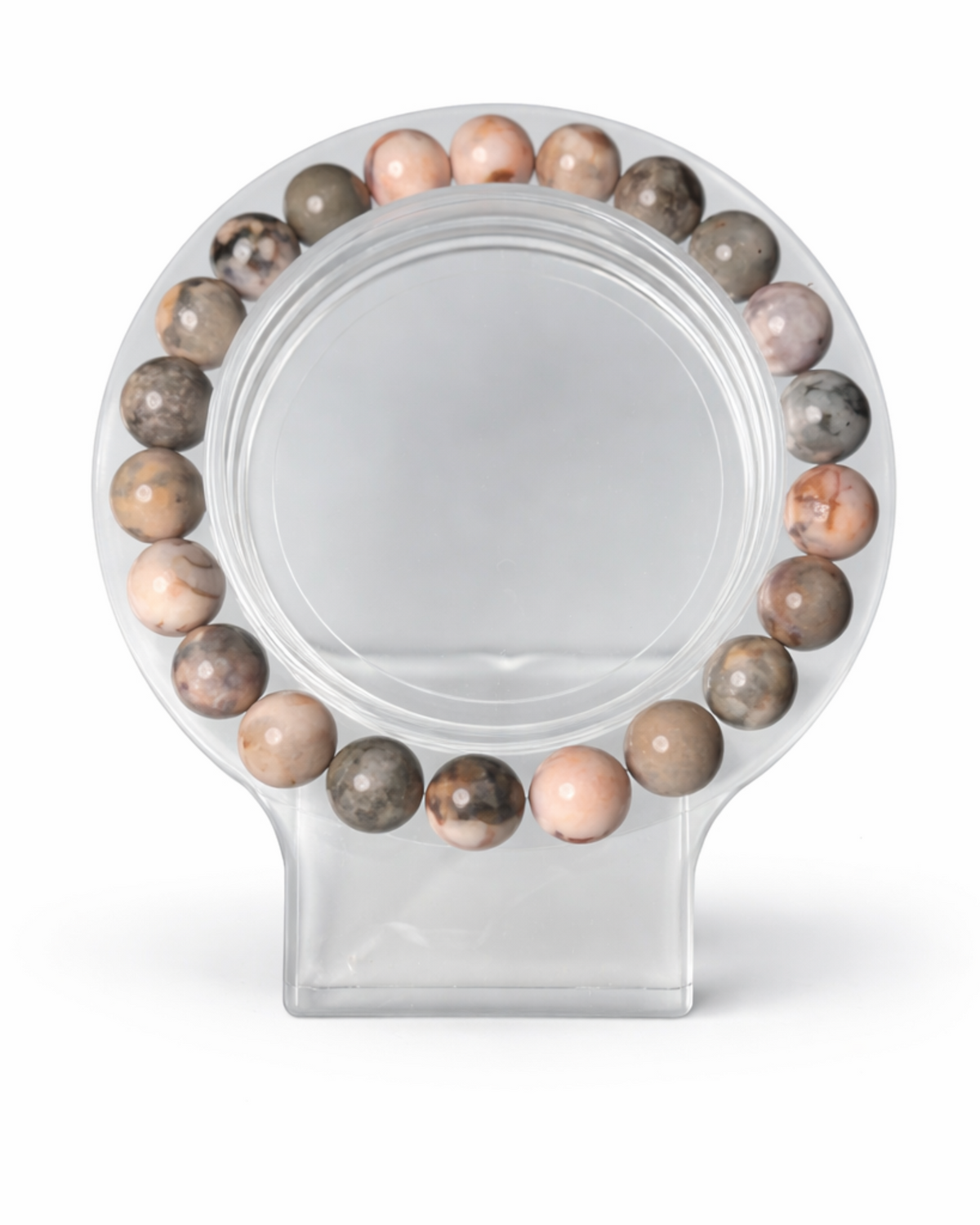 Amelia Jane Handmade Creations 7-inch pink zebra jasper beaded bracelet on a clear display stand