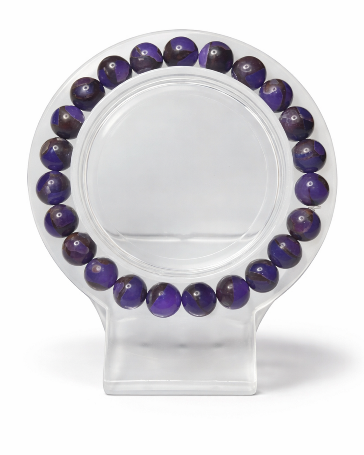 Amelia Jane Handmade Creations 7-inch purple chalcedony beaded bracelet on a clear circular display stand