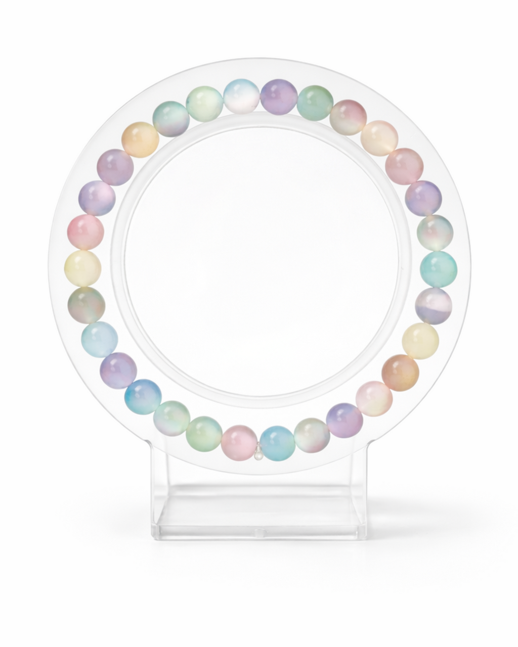 Amelia Jane Handmade Creations 7-inch rainbow selenite beaded bracelet on a clear circular display stand