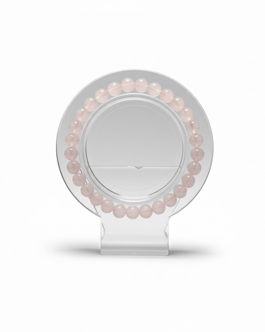 Amelia Jane Handmade Creations 7-inch rose quartz beaded bracelet displayed on a clear circular stand