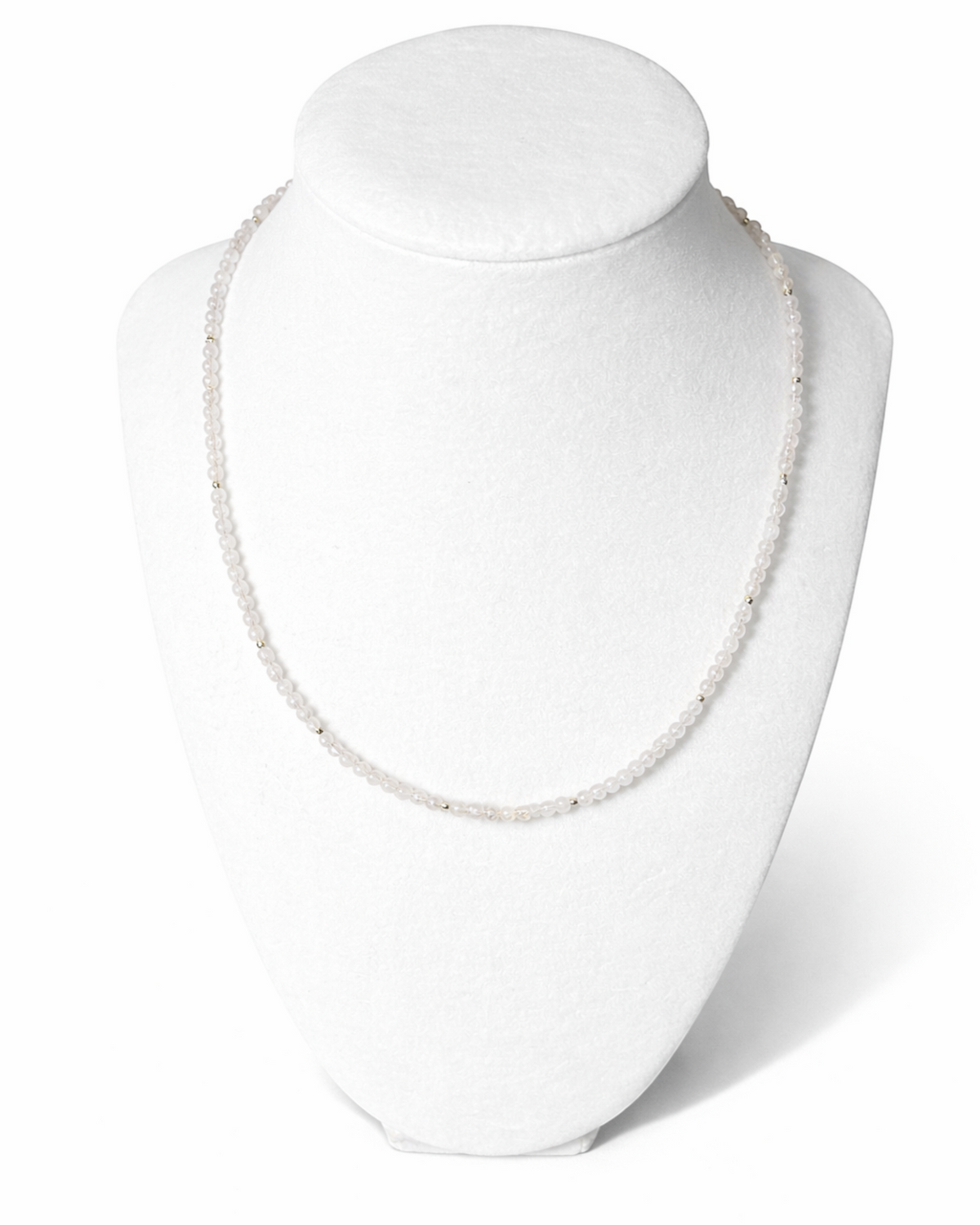 Amelia Jane Handmade Creations faceted rose quartz and gold hematite beaded necklace on a white display bust
