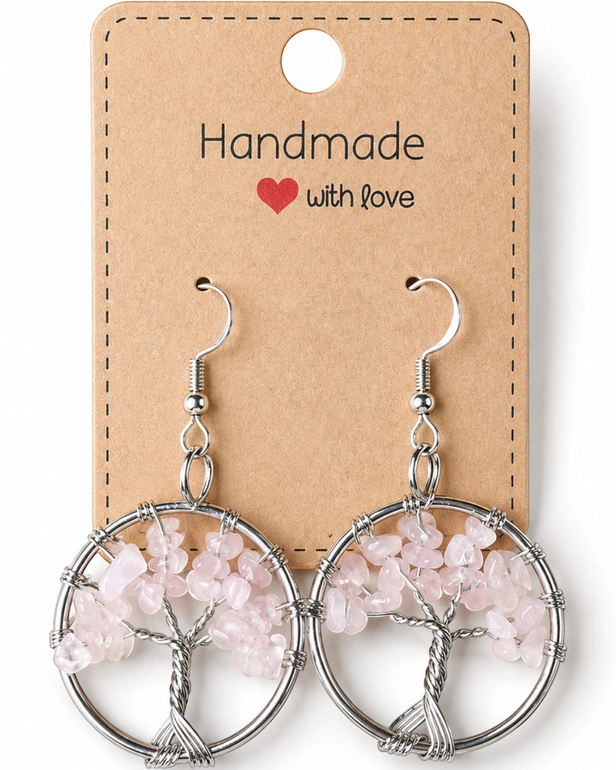 Amelia Jane Handmade Creations rose quartz tree of life earrings with silver wire-wrapped gemstone chips on display