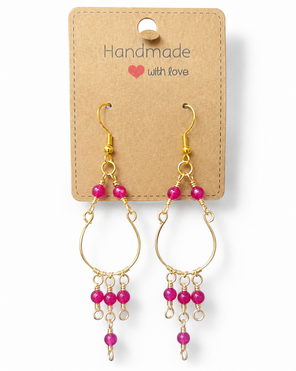 Amelia Jane Handmade Creations ruby chandelier earrings with gold wire and S925 posts on a display card.