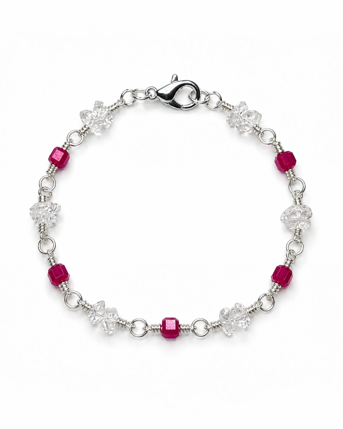 Amelia Jane Handmade Creations 7-inch station bracelet featuring faceted ruby beads and clear Herkimer diamonds.