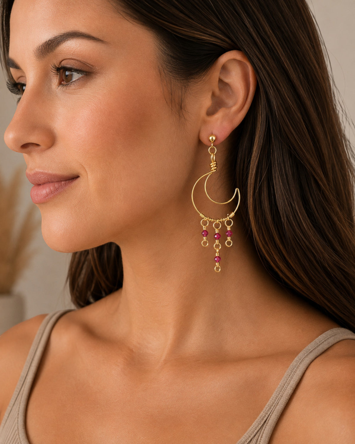 Amelia Jane Handmade Creations Ruby Moon earrings featuring gold crescent moons and dangling red ruby gemstones
