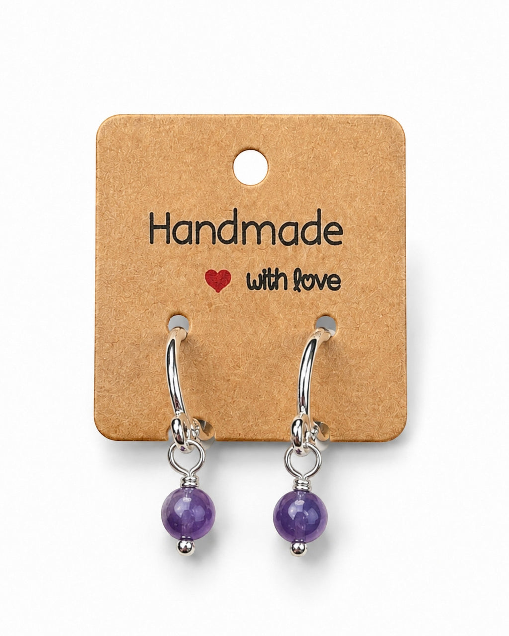 Amelia Jane Handmade Creations 15mm silver-filled huggie hoop earrings featuring dangling purple amethyst gemstones.