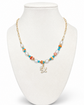 Amelia Jane Handmade Creations Salt and Sun necklace with gold filled chain, starfish pendant, and colorful beads.