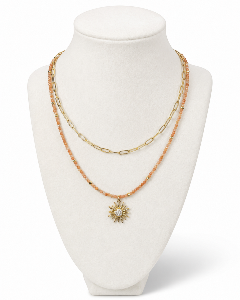 Amelia Jane Handmade Creations Golden Hour layered necklace with sunstone beads, gold chain, and sunburst pendant.