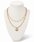 Amelia Jane Handmade Creations Golden Hour layered necklace with sunstone beads, gold chain, and sunburst pendant.